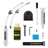 Bleedkit TRP Tektro Premium Gold hydraulic brake bleeding kit with fluid, components for bicycle brake maintenance and repair.