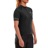 Altura Endurance women's short sleeve cycling jersey with reflective details and front pockets, designed for comfortable riding.