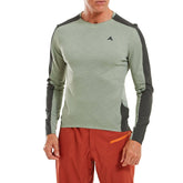 Altura Esker men's Polartec long sleeve trail cycling jersey in thermal fleece, shown on a hanger with a zipper and thumbholes.