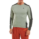 Altura Esker men's Polartec long sleeve trail cycling jersey in thermal fleece, shown on a hanger with a zipper and thumbholes.