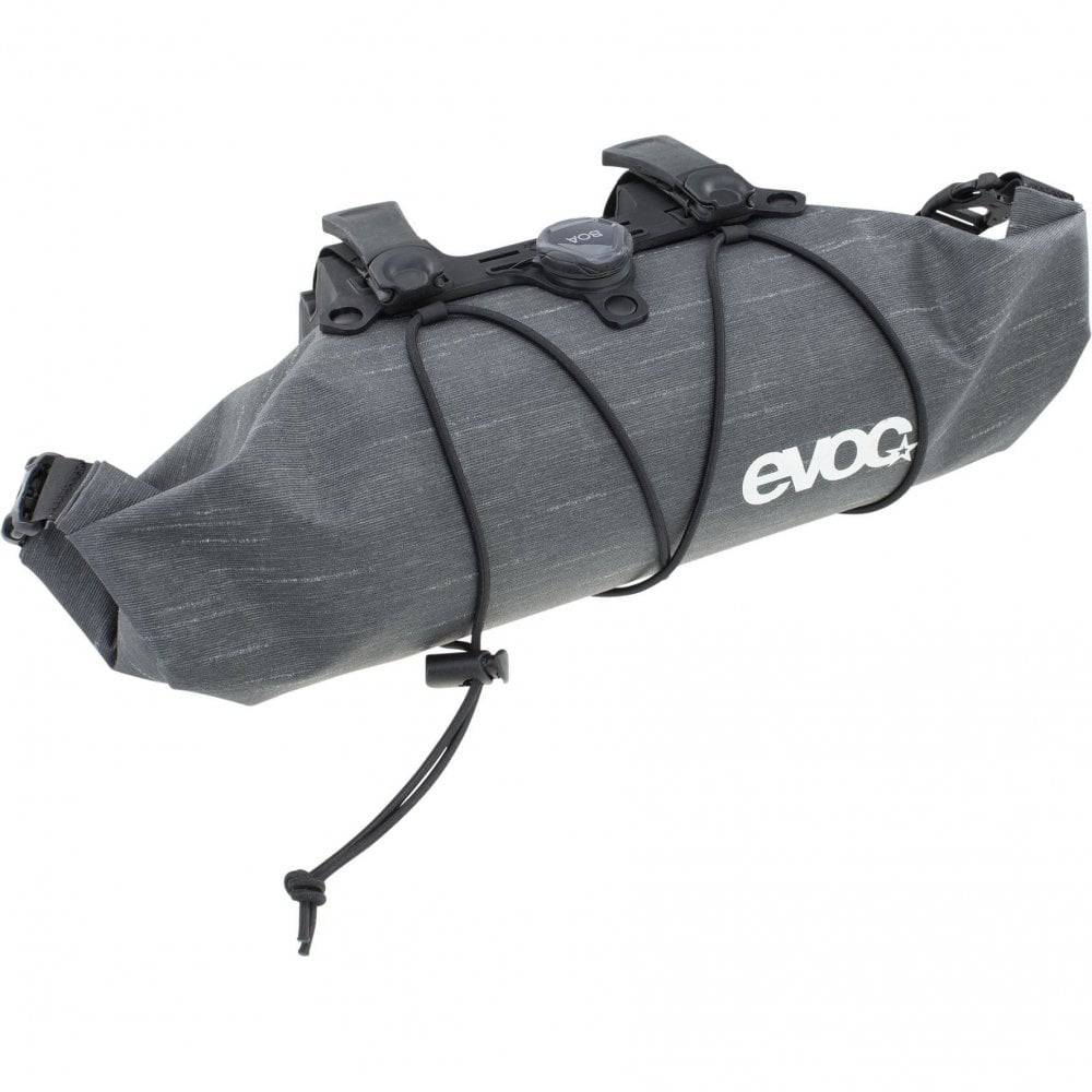 EVOC Handlebar Pack Boa WP 2.5L waterproof bike pannier bag with BOA fit system attached to a bicycle handlebar.