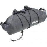 EVOC Handlebar Pack BOA WP 5L waterproof bike pannier attached to a bike handlebar with secure fit system.
