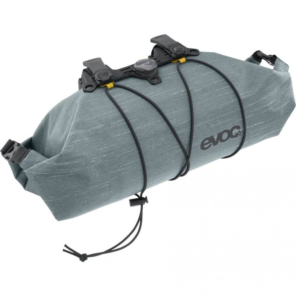 EVOC Handlebar Pack BOA WP 5L waterproof bike pannier with secure fit system, mounted on a bicycle handlebar.