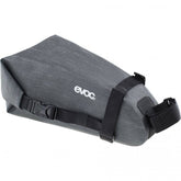 EVOC waterproof bike saddle bag with velcro straps, compact 2L storage for cycling accessories on a bike seat.