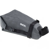 EVOC waterproof bike saddle bag with velcro straps, compact 2L storage for cycling accessories on a bike seat.