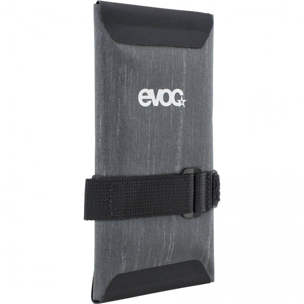 EVOC waterproof bike tool wrap with saddle mount panniers and bags, designed for organizing and carrying bike tools and accessories.