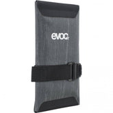 EVOC waterproof bike tool wrap with saddle mount panniers and bags, designed for organizing and carrying bike tools and accessories.