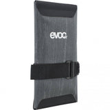 EVOC waterproof bike tool wrap with saddle mount panniers and bags, designed for organizing and carrying bike tools and accessories.