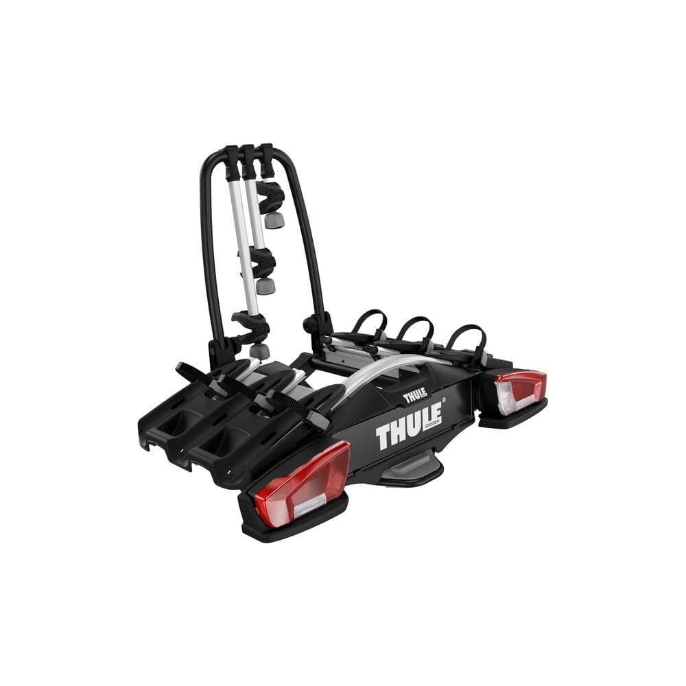Thule VeloCompact 926021 3-bike towball carrier with 13-pin connector, mounted on a vehicle for bike transport.