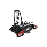Thule VeloCompact 926021 3-bike towball carrier with 13-pin connector, mounted on a vehicle for bike transport.