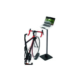 Elite Posa indoor cycling device support stand holding a laptop, tablet, and smartphone during workout sessions.