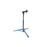 Park Tool PRS-26 Team Issue bike repair stand with adjustable clamp and tripod base for workshop use.