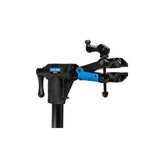 Park Tool PRS-26 Team Issue bike repair stand with adjustable clamp and tripod base, ideal for workshop bike maintenance.