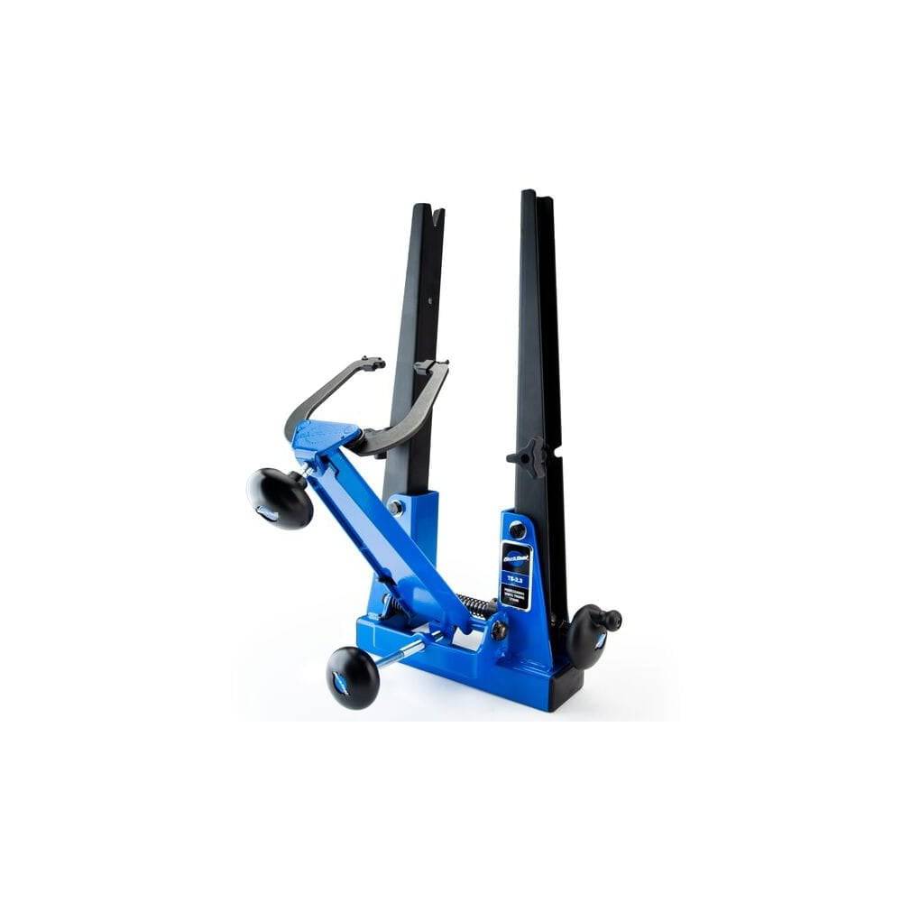 Park Tool TS-2.3 professional wheel truing stand for road, MTB, and BMX wheels, used in bike workshop settings