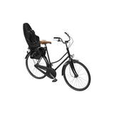 Thule Yepp 2 Maxi child seat rear rack mount for bike accessories, featuring safety and comfort for young riders.