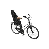 Thule Yepp 2 Maxi child bike seat rear mount with safety harness and tube attachment for secure cycling with kids
