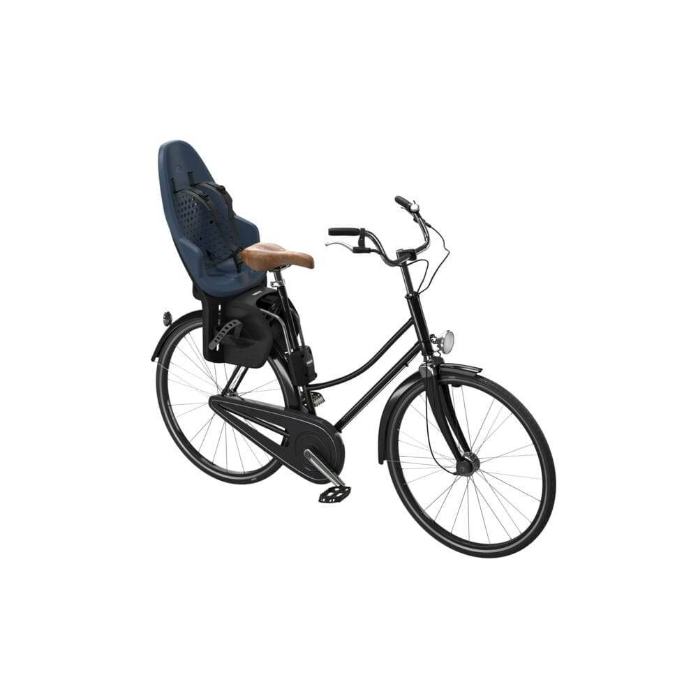 Thule Yepp 2 Maxi child bike seat with safety harness, rear seat tube mount, durable accessories for secure riding.