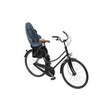 Thule Yepp 2 Maxi child bike seat rear mount with safety harness, accessory for secure bike riding with young children.