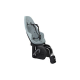 Thule Yepp 2 Maxi child bike seat rear mount with safety harness, designed for secure bike riding with young children.