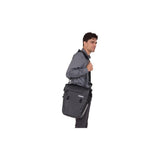 Pair of Thule Shield waterproof bike panniers with reflective panels, designed for touring and commuting, attached to a bicycle.