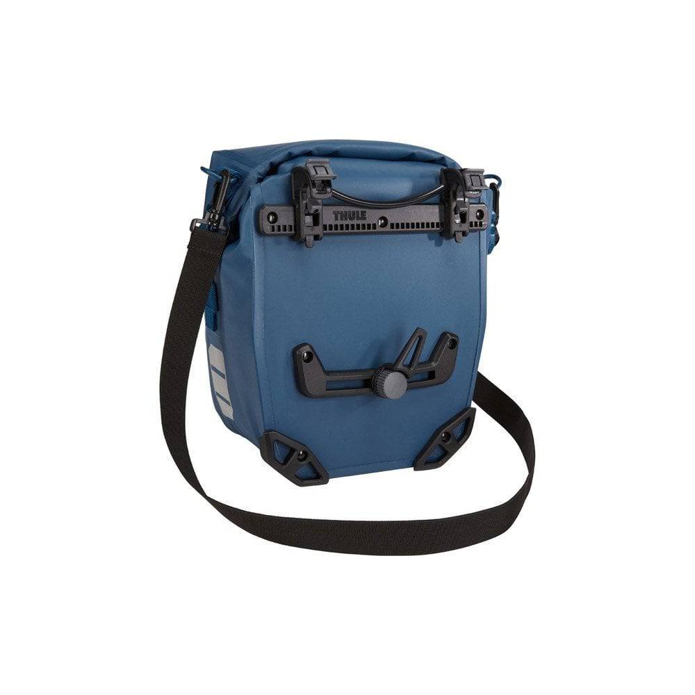 Pair of Thule Shield waterproof bike panniers with reflective panels, ideal for touring and commuting bike accessories.