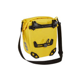 Pair of Thule Shield waterproof bike panniers with reflective panels, designed for touring and commuter cycling accessories.
