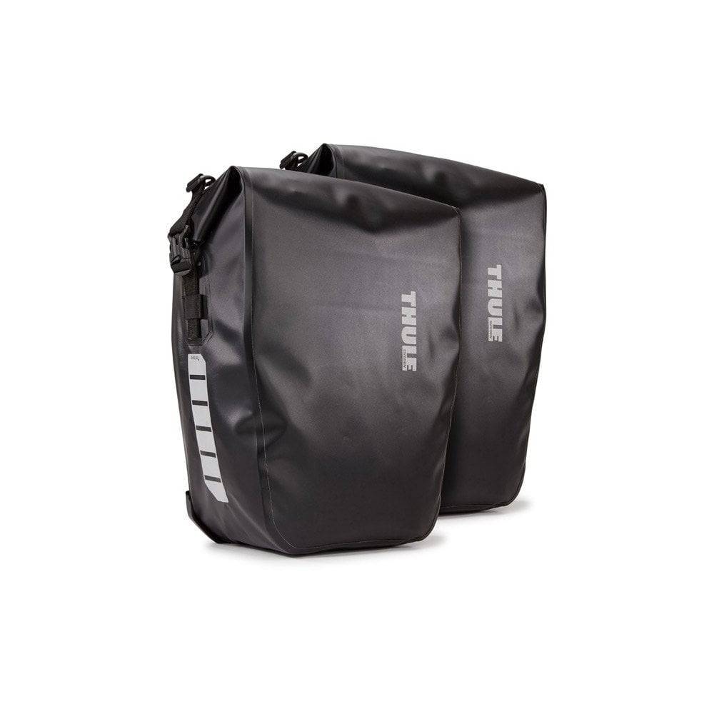 Pair of Thule Shield waterproof bike panniers with reflective panels, designed for touring and commuting bike accessories.