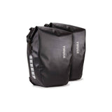 Pair of Thule Shield waterproof bike panniers with reflective panels, designed for touring and commuting bike accessories.