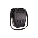 Pair of Thule Shield waterproof bike panniers with reflective panels, designed for touring and commuter cycling accessories.