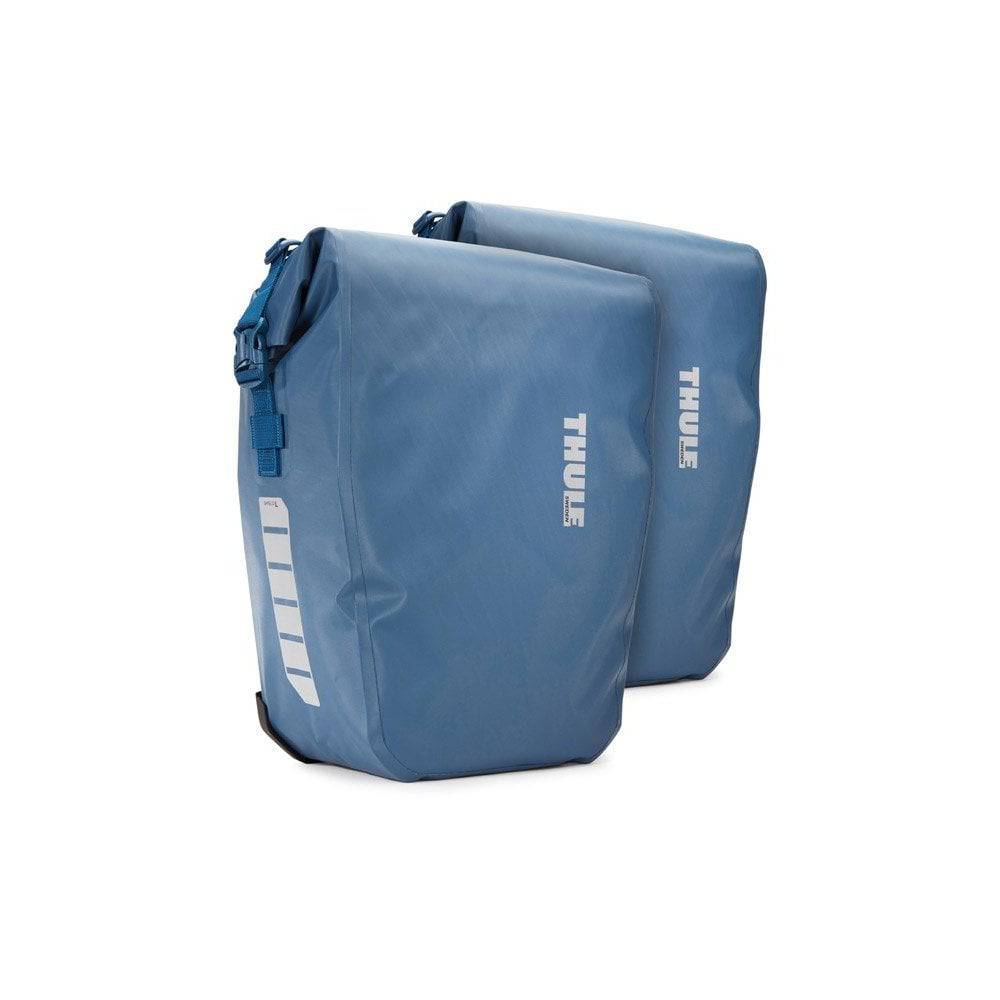 Pair of Thule Shield waterproof bike panniers with reflective panels, designed for touring and commuting bike accessories.