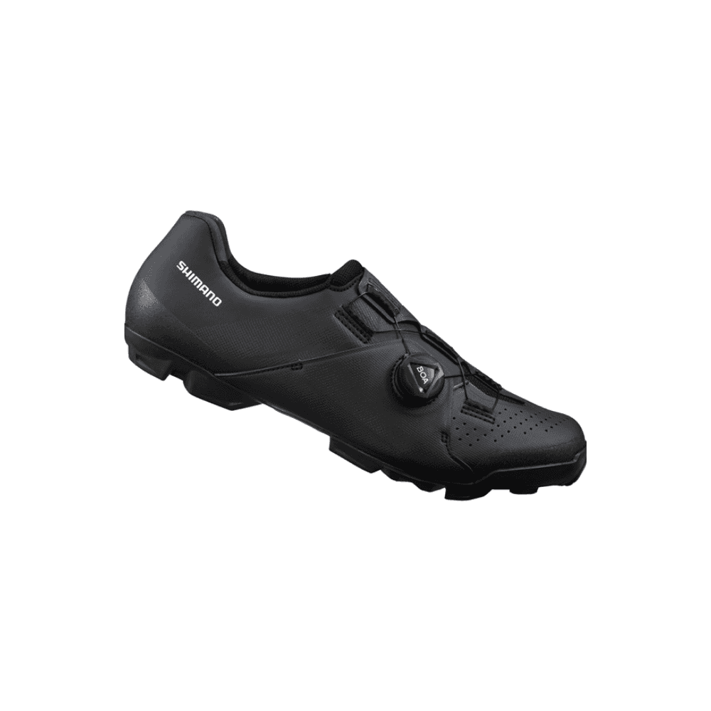 Shimano XC5 SPD MTB shoes in green with BOA L6 dial and ULTREAD sole, designed for mountain biking.