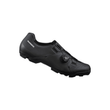Shimano XC5 SPD MTB shoes in green with BOA L6 dial and ULTREAD sole, designed for mountain biking.