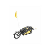 Topeak Journey Trailer attached to bike with waterproof drybag and SlideLock for 26-inch or 700c bikes, outdoor cycling accessory