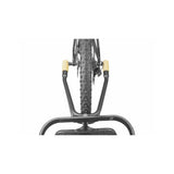Topeak Journey Trailer attached to a bicycle with waterproof drybag and SlideLock for 26-inch or 700c bikes.