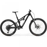 Merida One-Sixty 8000 mountain bike with adjustable suspension and SRAM GX AXS wireless drivetrain, shown outdoors on trail.