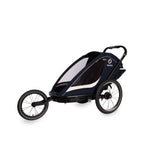 Hamax Breeze child bike trailer with stroller wheel, safety features, and durable frame for secure family biking adventures.