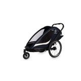 Hamax Breeze child bike trailer with stroller wheel, safety features, and durable frame, designed for secure family biking adventures.