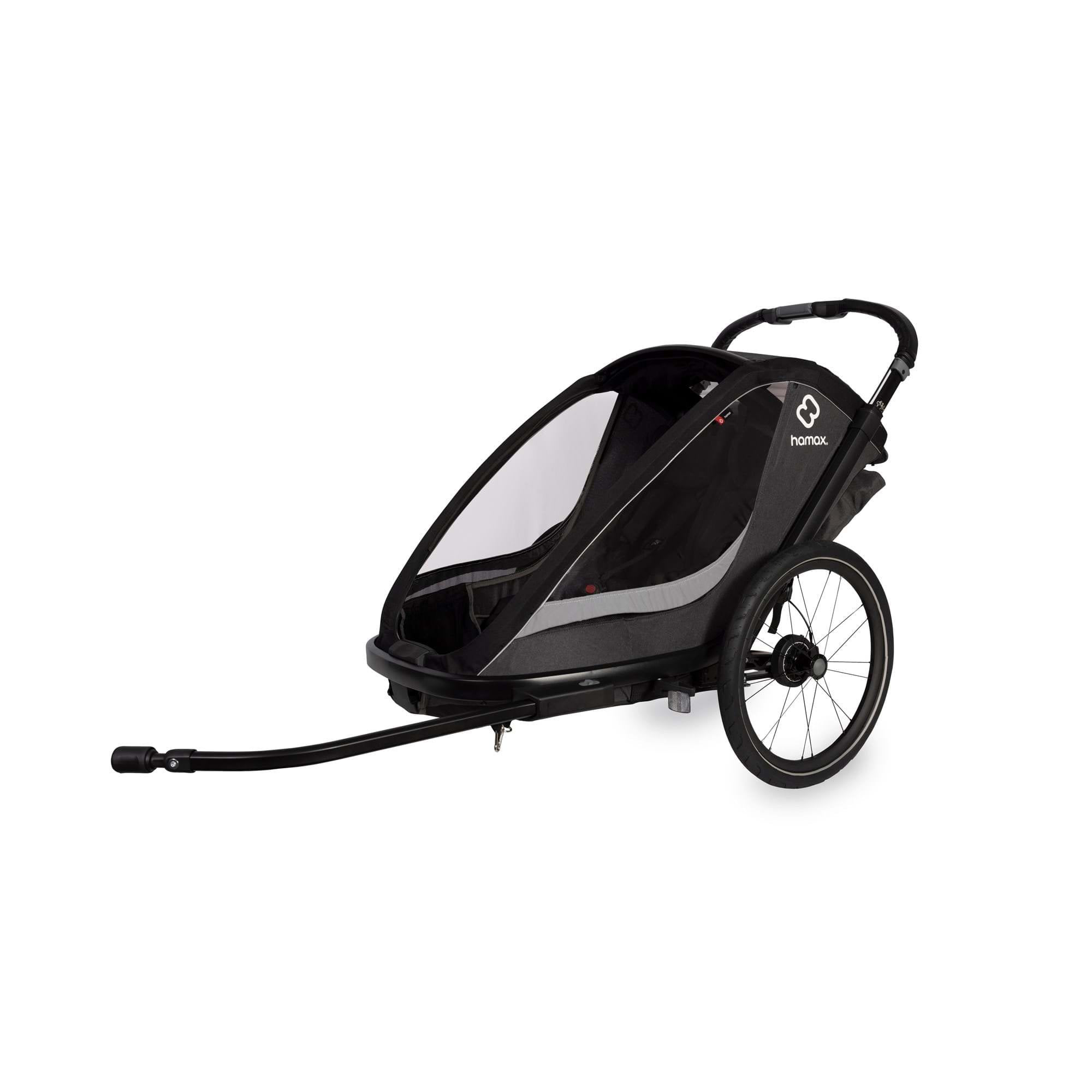 Hamax Cocoon Twin child bike trailer and stroller with brake, featuring a sleek design and convertible features for kids' outdoor activities.