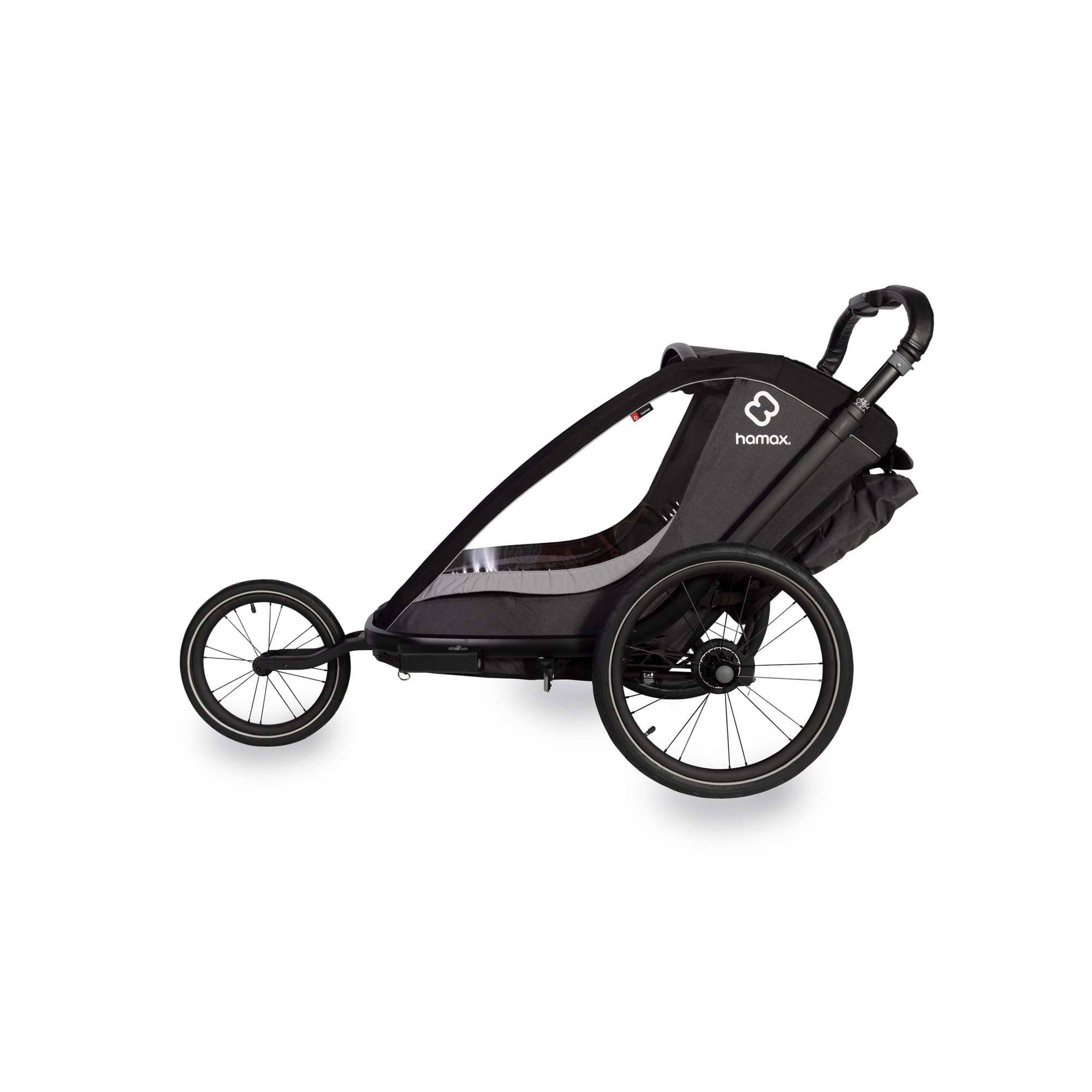 Hamax Cocoon Twin child bike trailer and stroller with brake, featuring a durable frame and comfortable seating for two children.