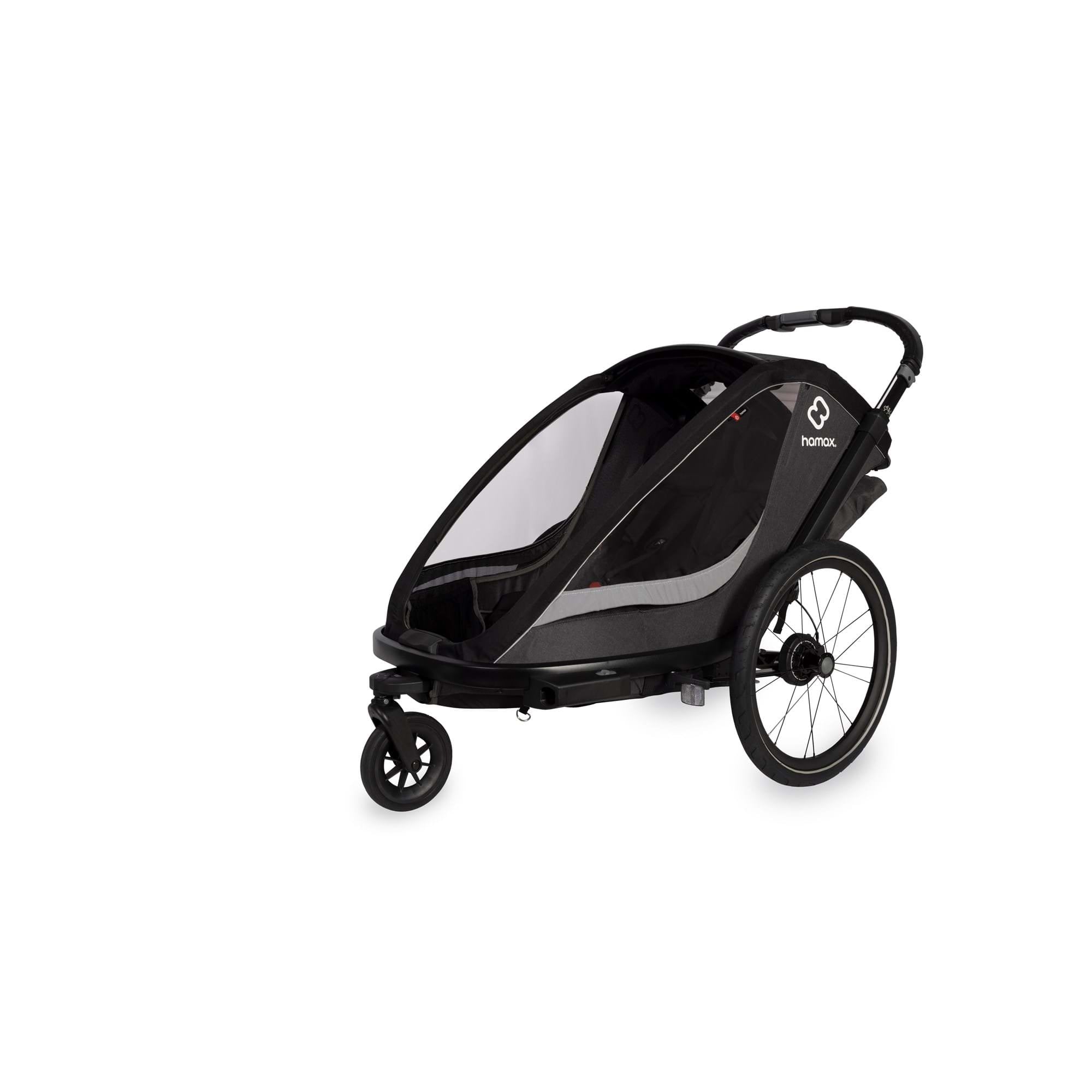 Hamax Cocoon Twin child bike trailer and stroller with brake, featuring convertible design and safety features for kids.