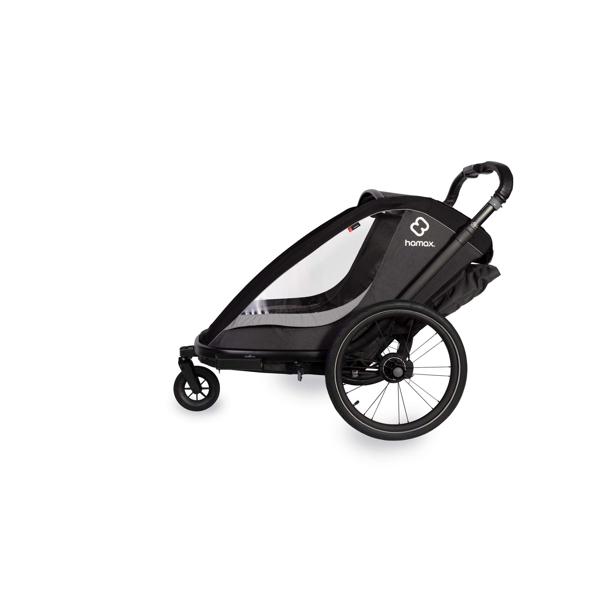 Hamax Cocoon Twin child bike trailer and stroller with brake, featuring a convertible design for biking, jogging, and strolling.