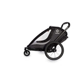 Hamax Cocoon Twin child bike trailer and stroller with brake, featuring a convertible design for biking, jogging, and strolling.