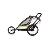 Hamax Breeze Twin child bike trailer and stroller conversion with safety features, showing the sturdy frame and seating area.
