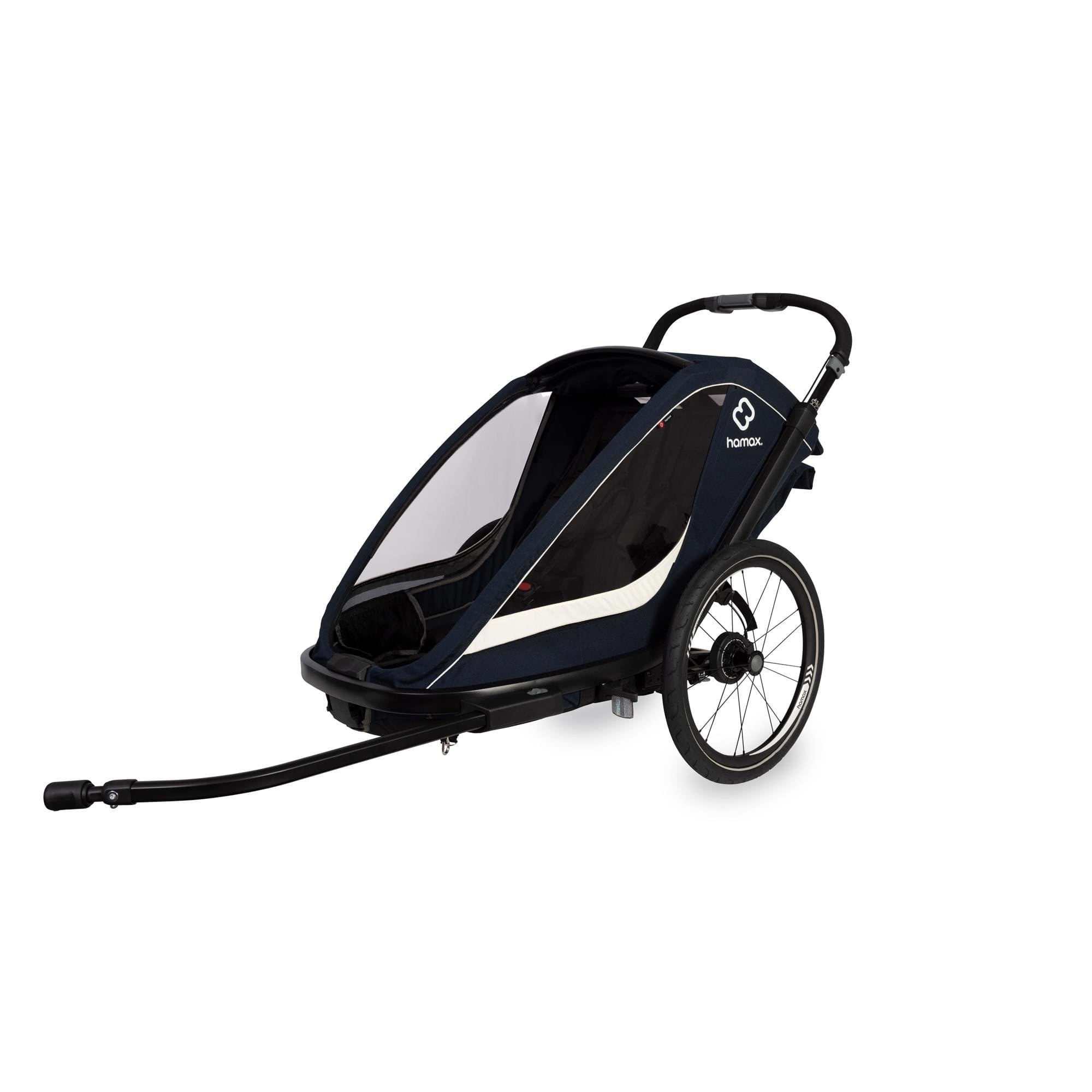 Hamax Breeze twin child bike trailer with stroller conversion, safety harnesses, and durable frame for family outdoor activities.