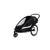 Hamax Breeze Twin child bike trailer with stroller conversion, safety harness, and secure frame for kids' outdoor adventures