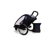 Hamax Breeze Twin child bike trailer with stroller conversion, safety features, and durable design for family outdoor activities.
