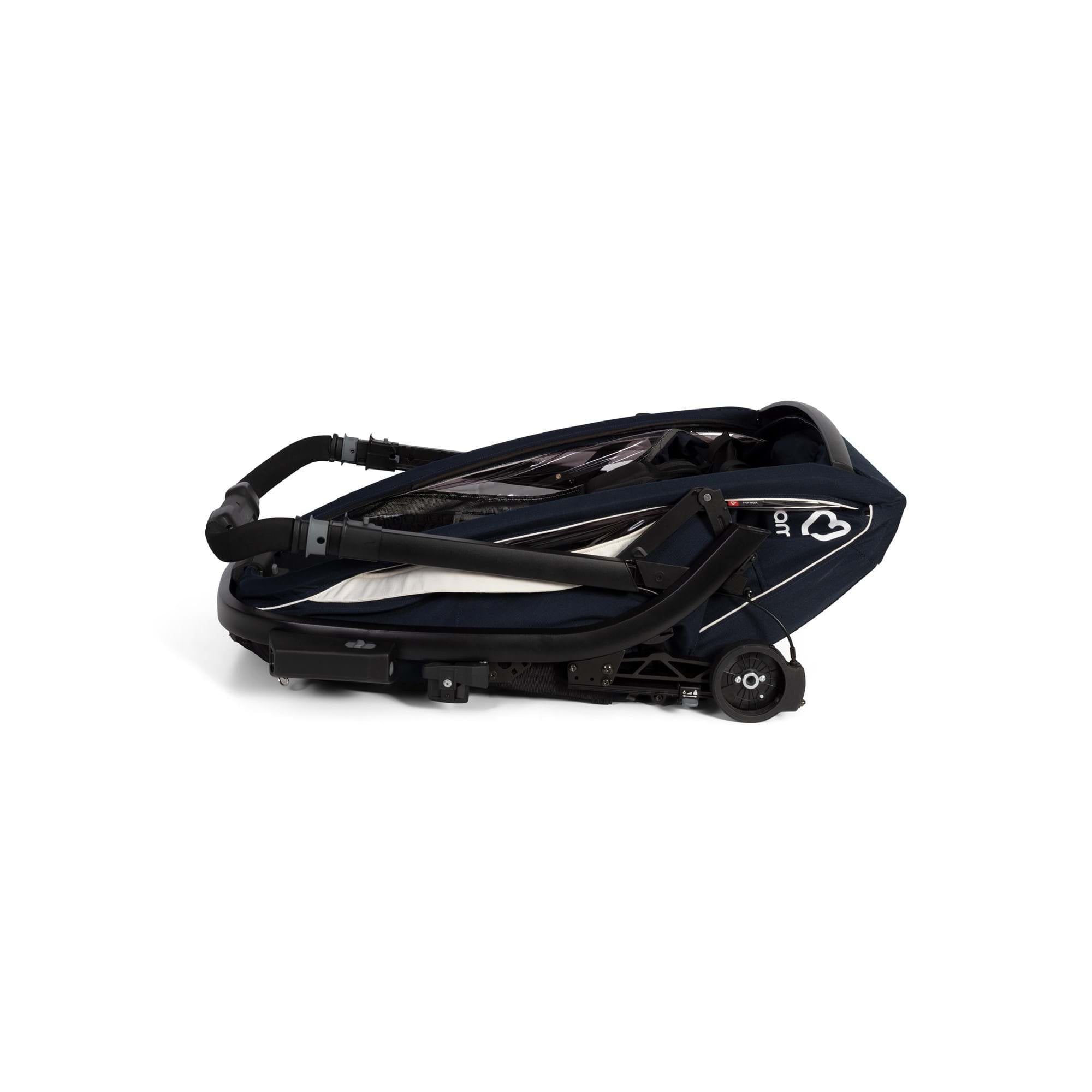 Hamax Breeze Twin Child Bike Trailer with stroller conversion and safety features, designed for family cycling adventures.