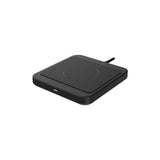 Quad Lock MAG wireless charging pad with magnetic alignment for phones and accessories, featuring sleek design and charging surface.