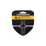 Jagwire Mountain Pro Canti brake pads in black for SRAM and Shimano linear pull bike brakes, close-up view of components.