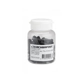 Black Jagwire sealed end caps for 4mm shift cable housing, plastic components, shown in a 100-pack for bike gear maintenance.